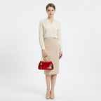 Soffien Pearl Tassel Clutch